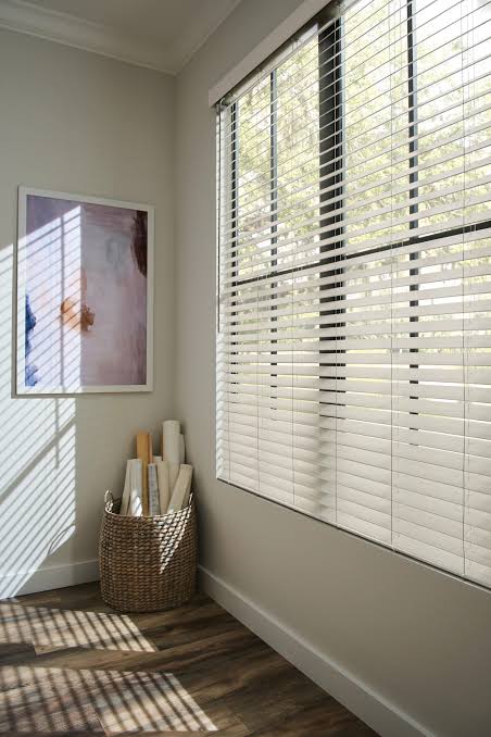 Faux Wood Blinds installed in a professionally designed interior